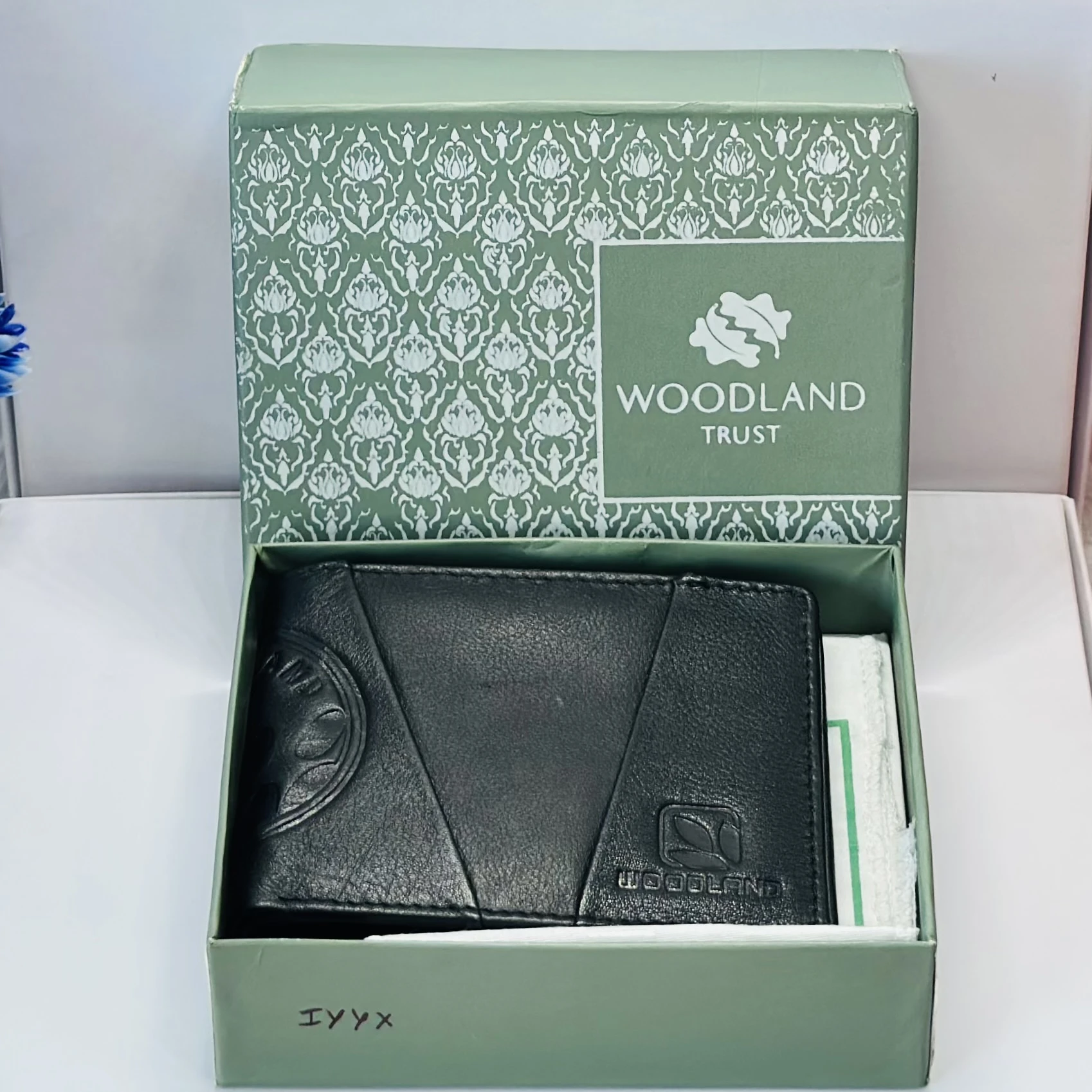 Black Woodland men's leather two-fold wallet.