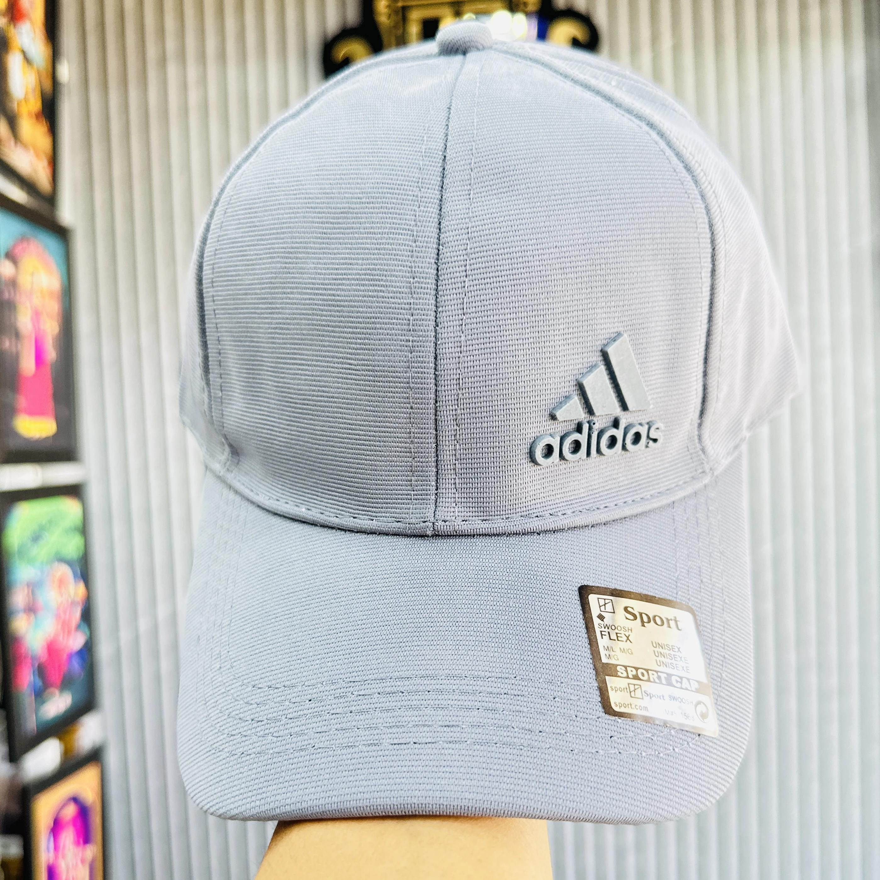 Adidas Men's Release Structured Stretch Fit Cap or similar model.
