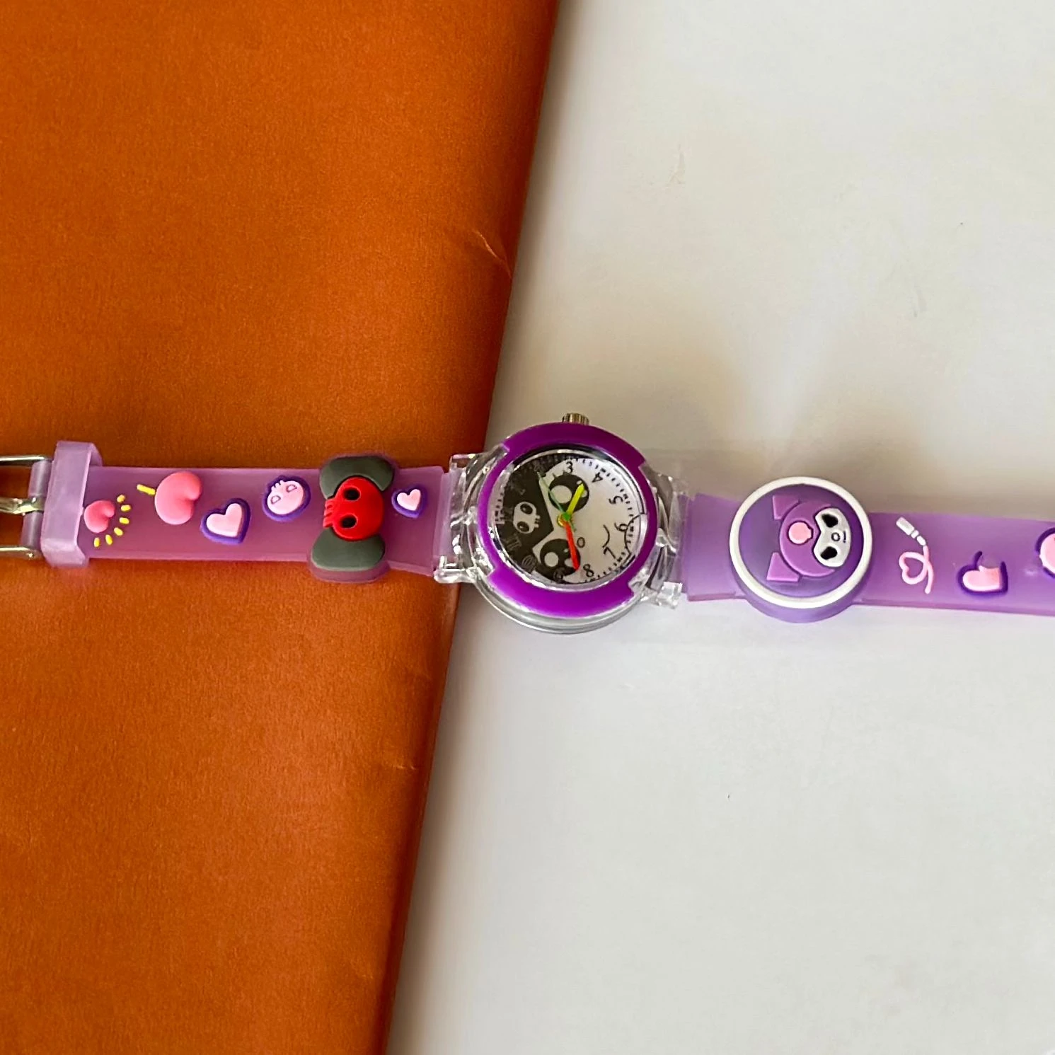 Kids analog watch with a purple silicone strap