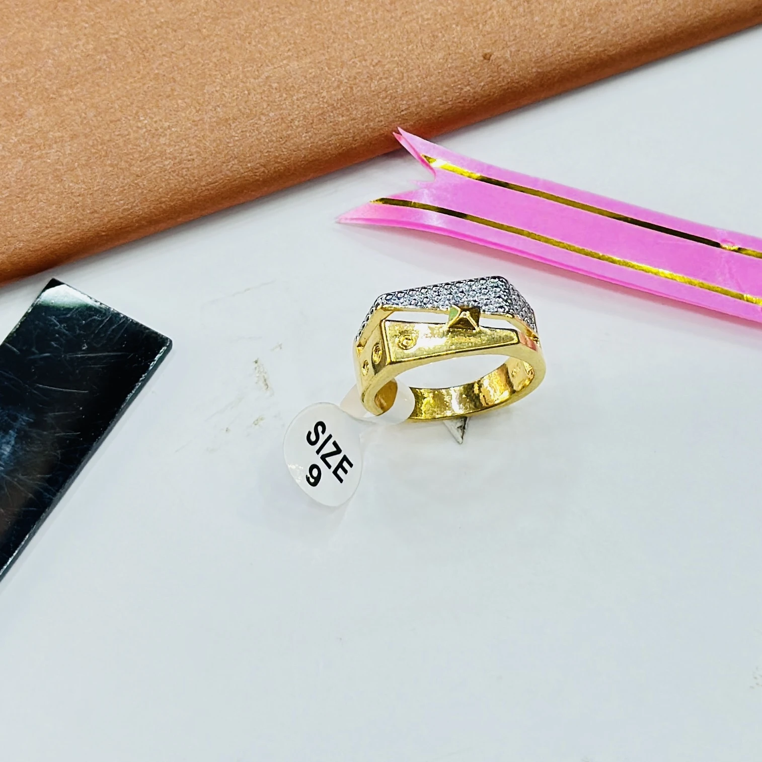 gents gold ring with American diamond embellishments