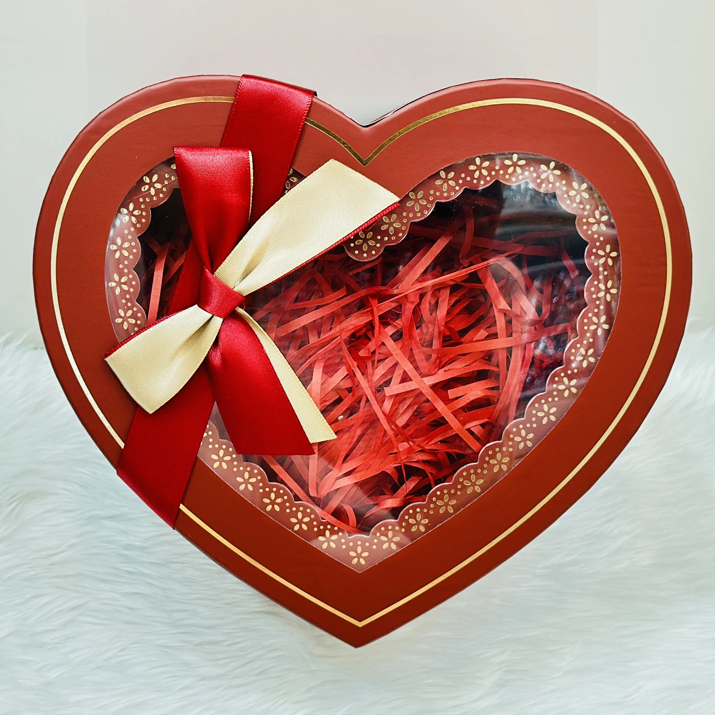 Decorative red heart-shaped box
