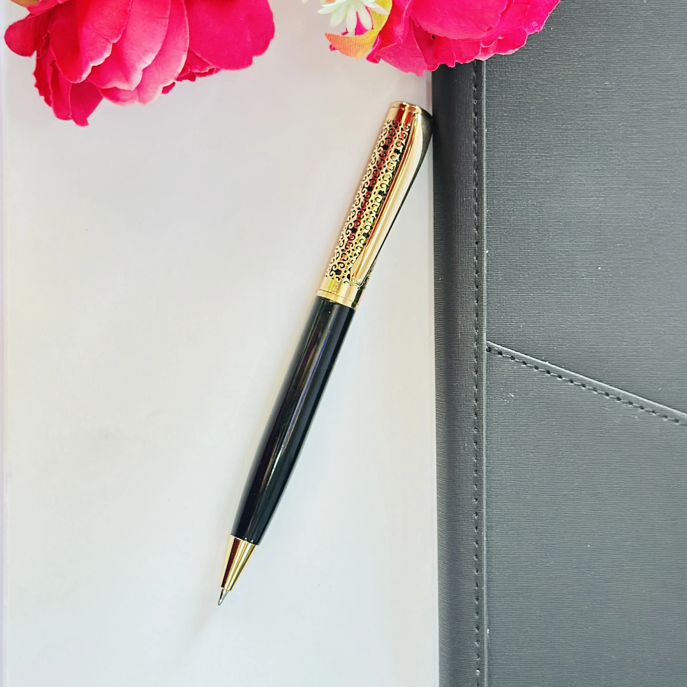 Black and gold ballpoint pen