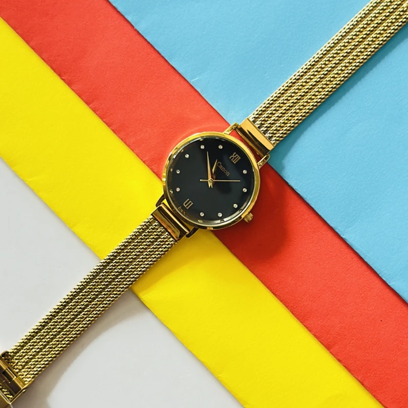 Gold tone analog wristwatch