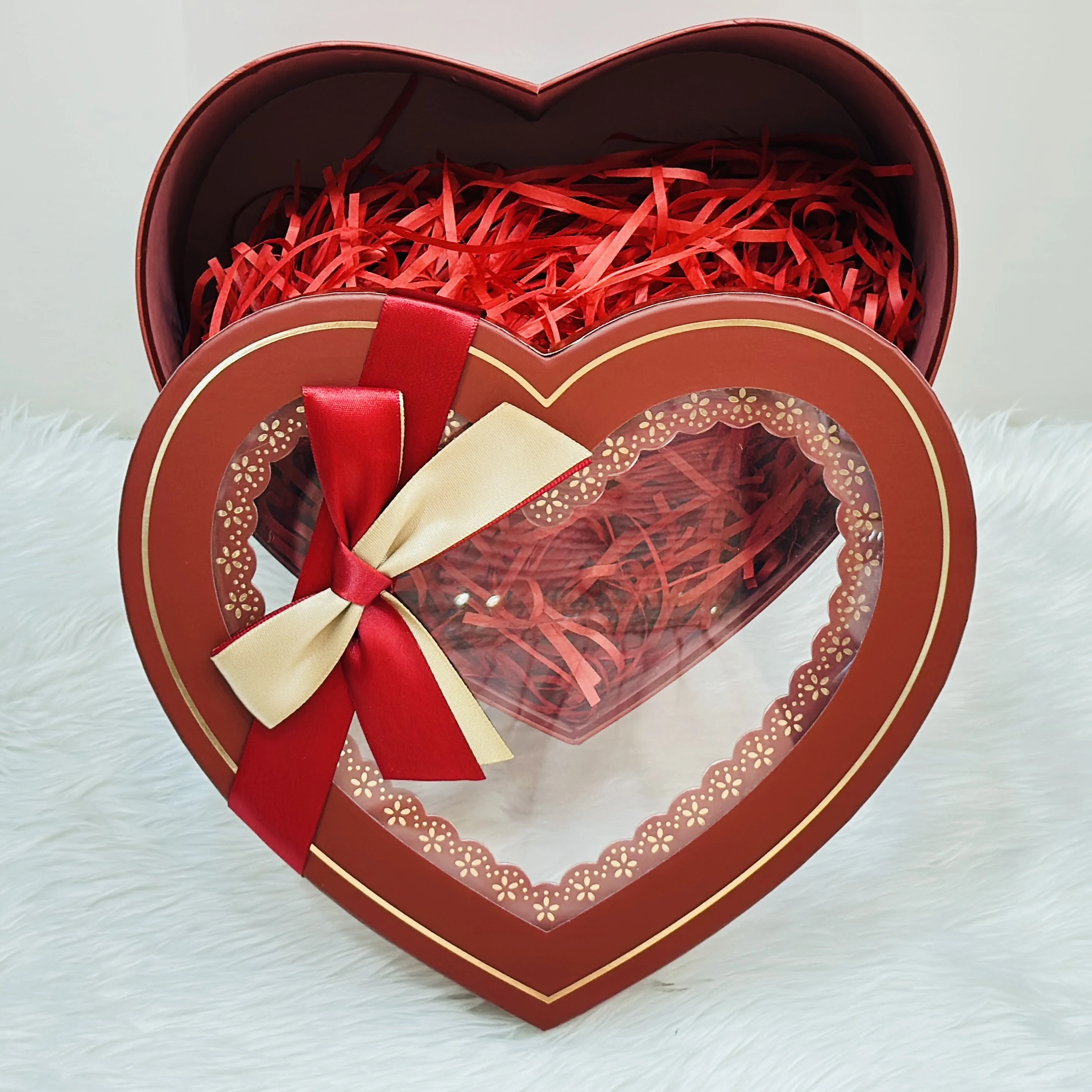 Decorative red heart-shaped box