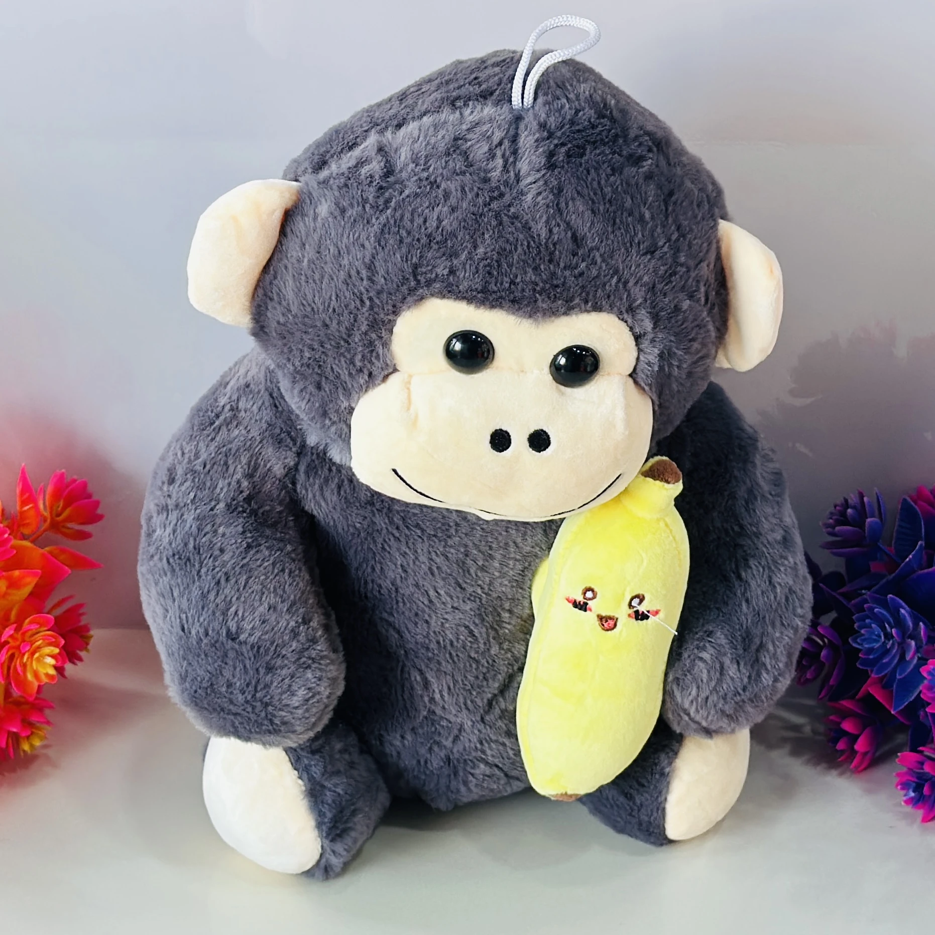 Soft grey monkey plush toy