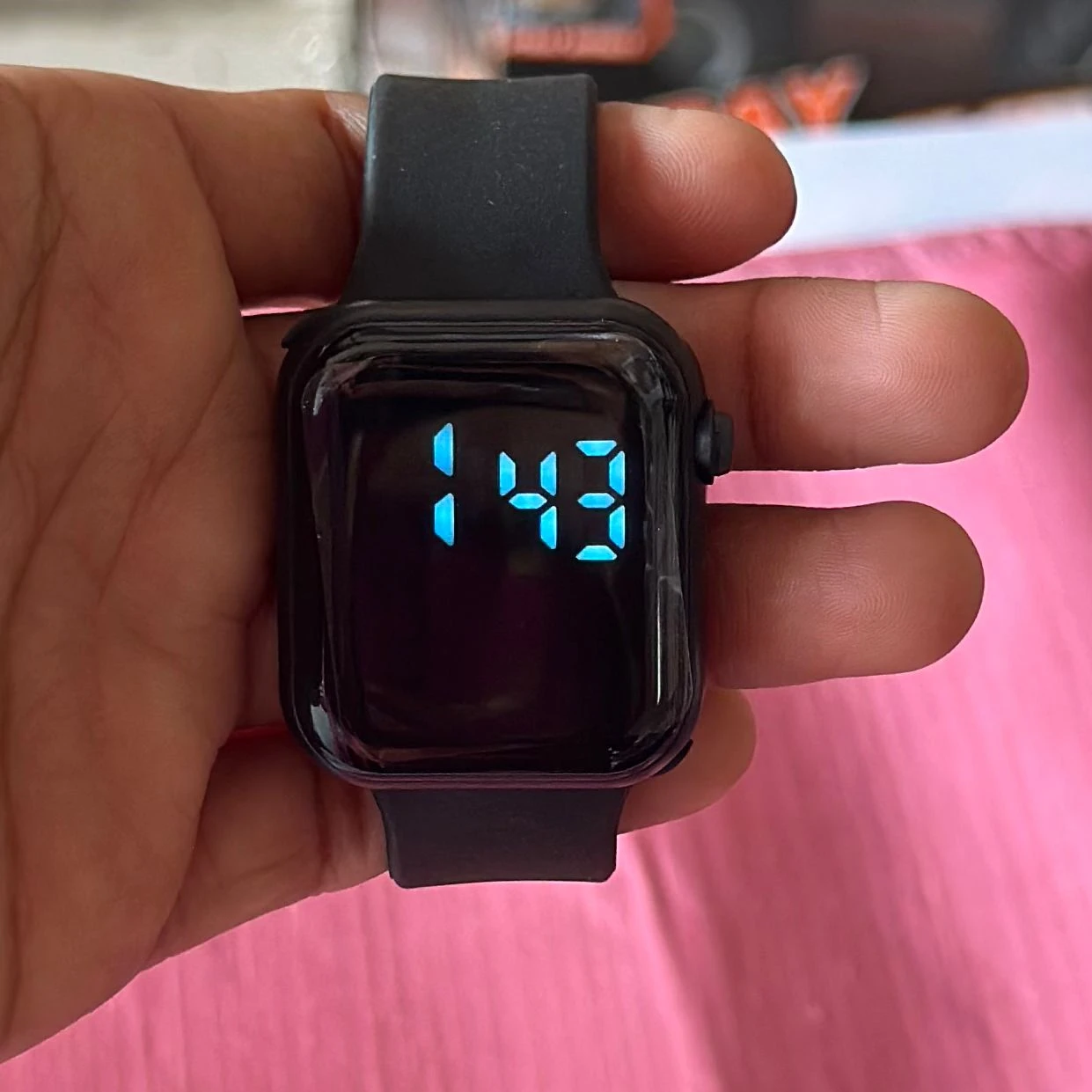 appears to be a T10 Ultra smartwatch, a non-branded wearable device.