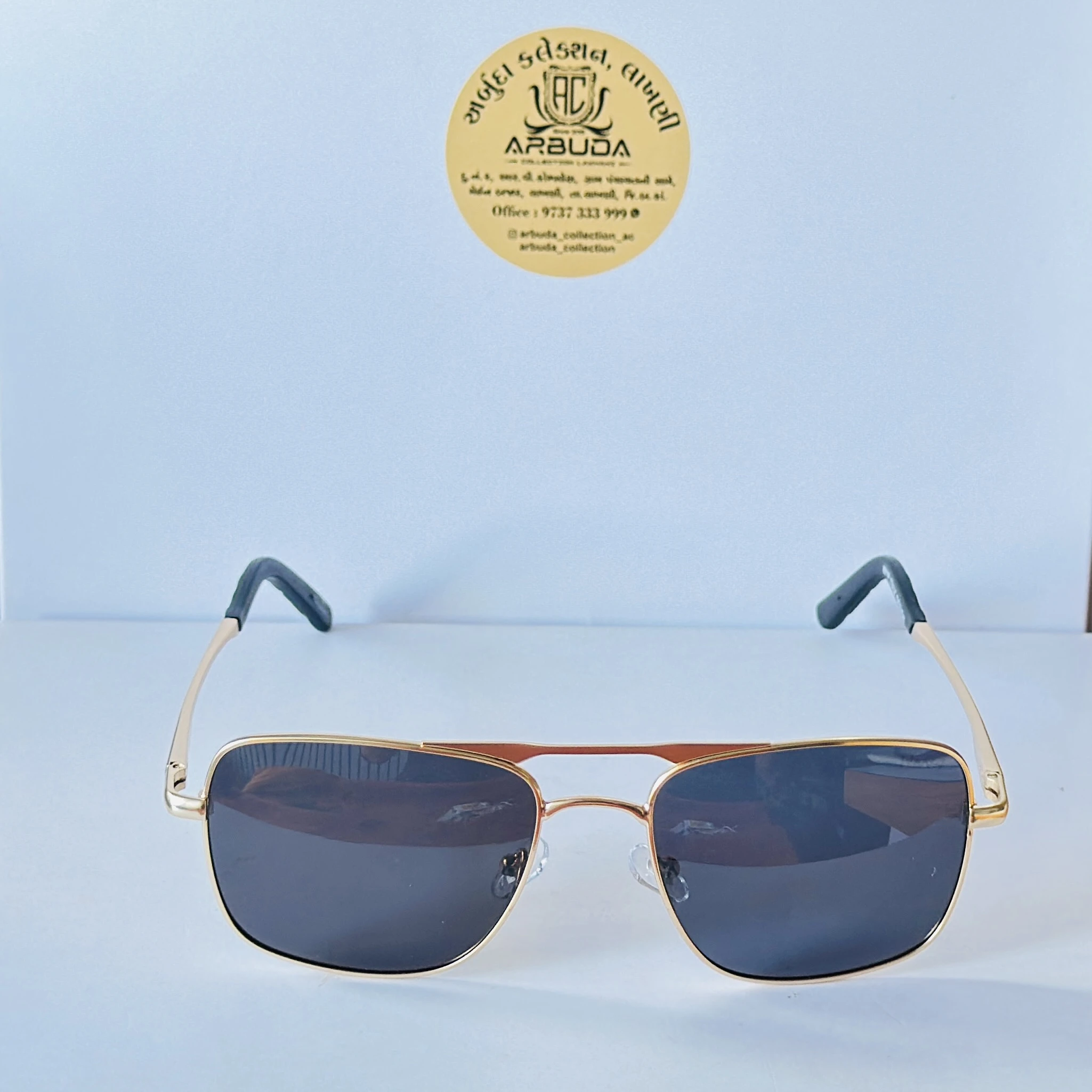 pair of retro square aviator sunglasses