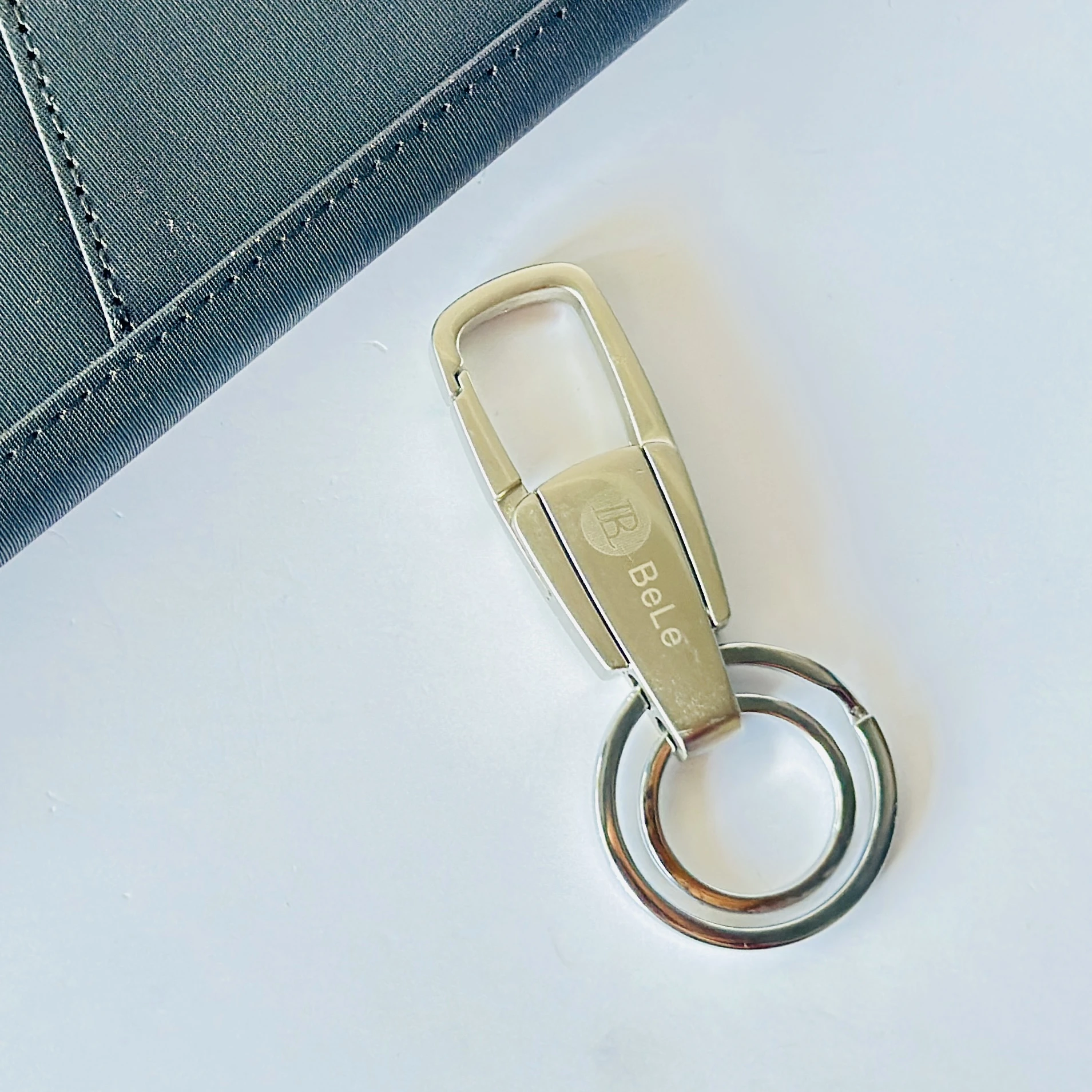 silver-toned metal keychain