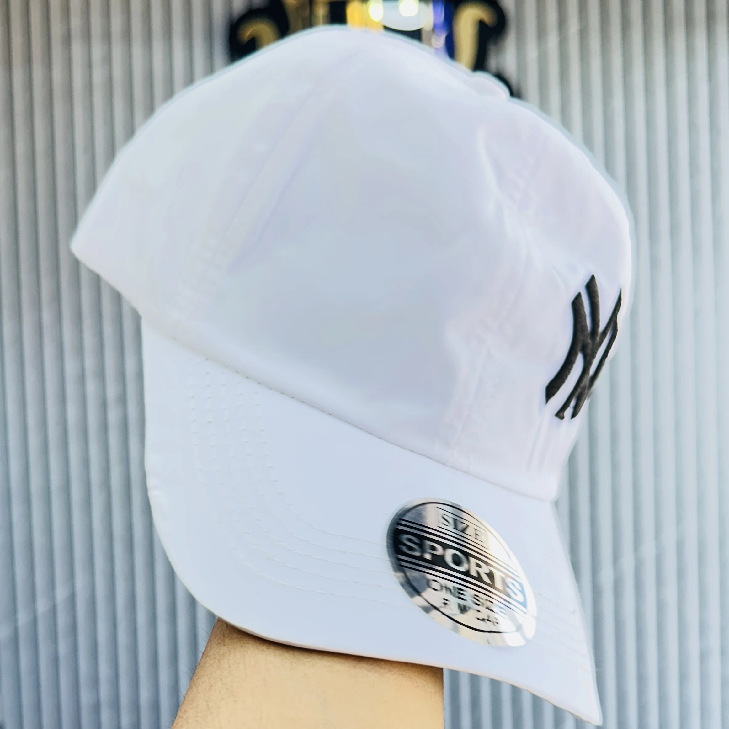 white baseball cap