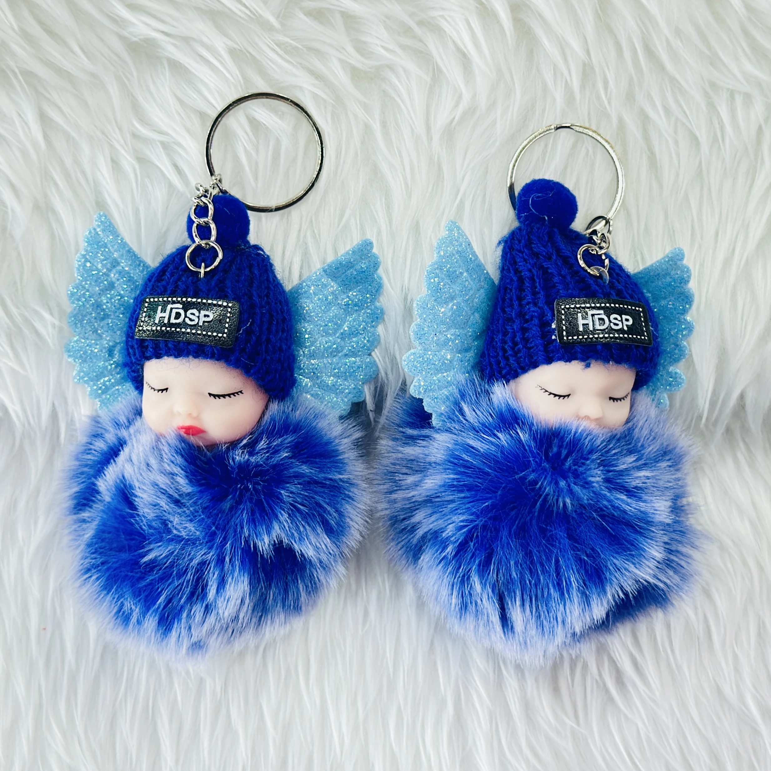 sleeping baby doll keychain