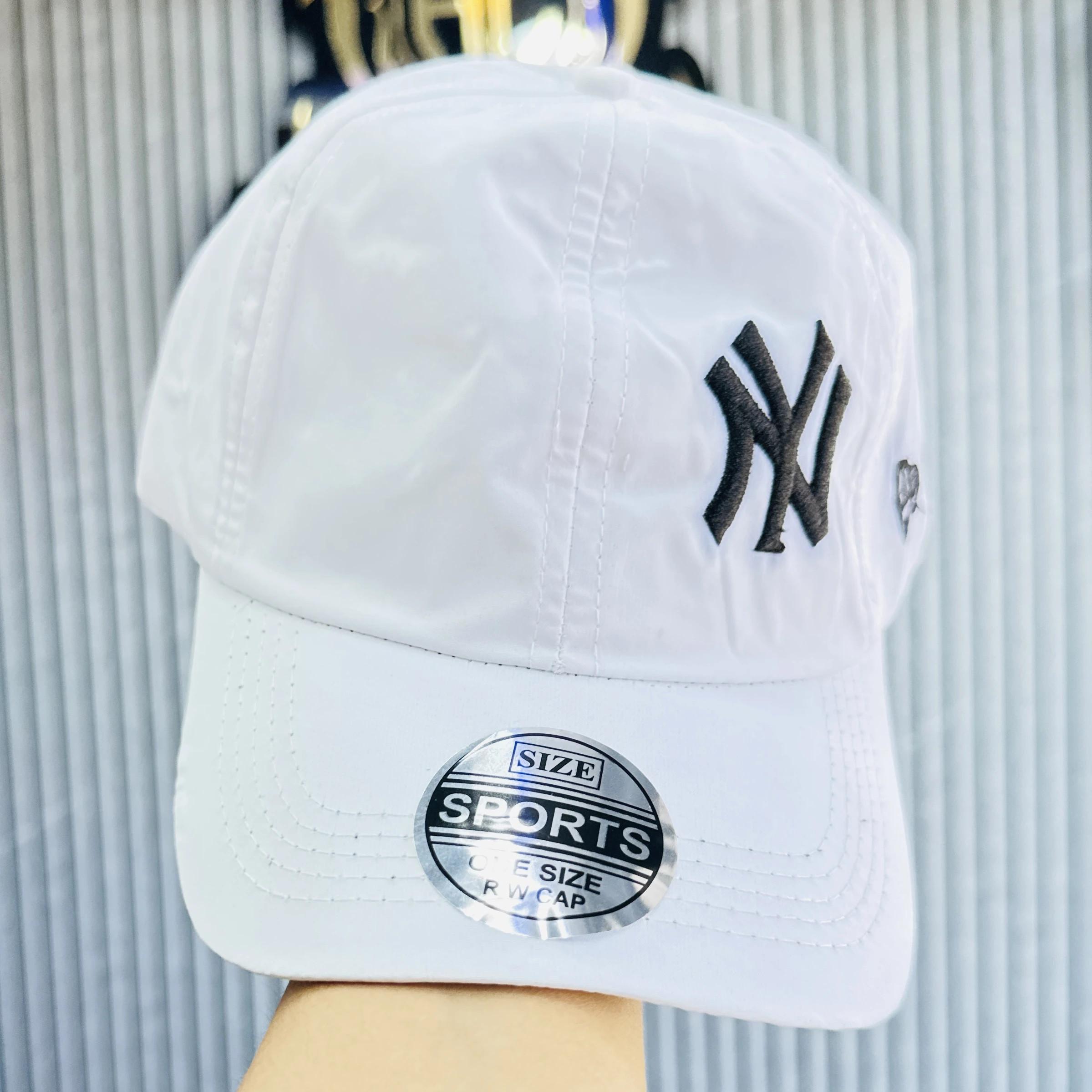 white baseball cap