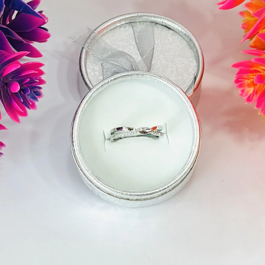 Silver intertwined couple's ring
