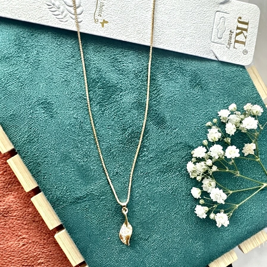 pendant features a pear-shaped