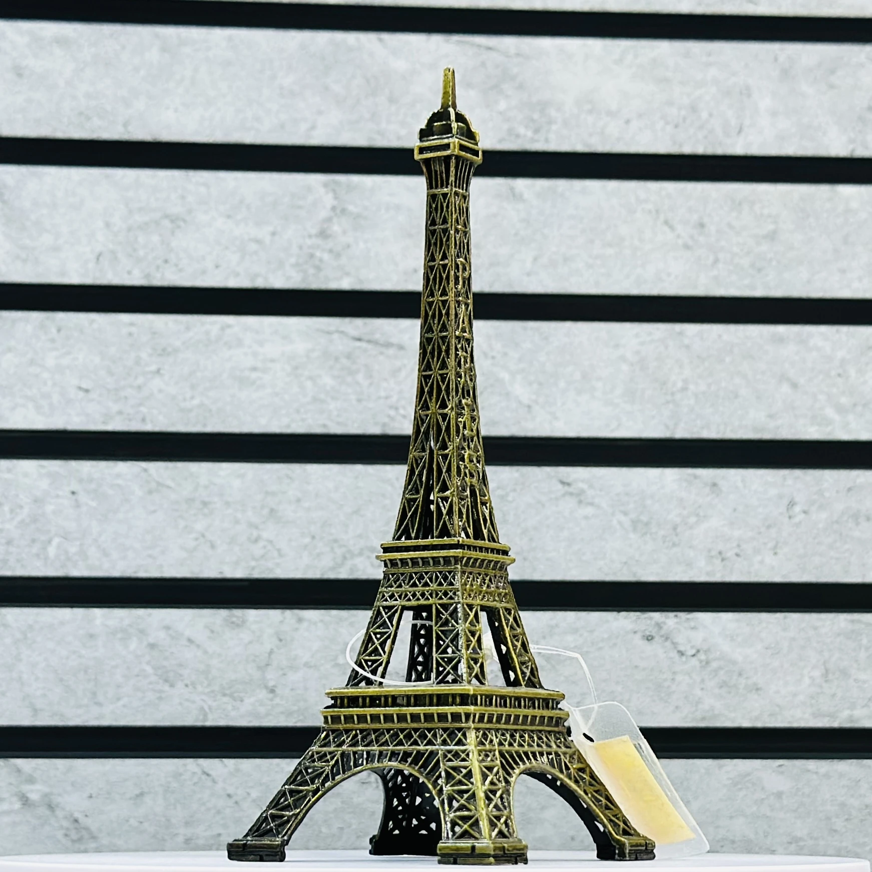 miniature replica of the Eiffel Tower