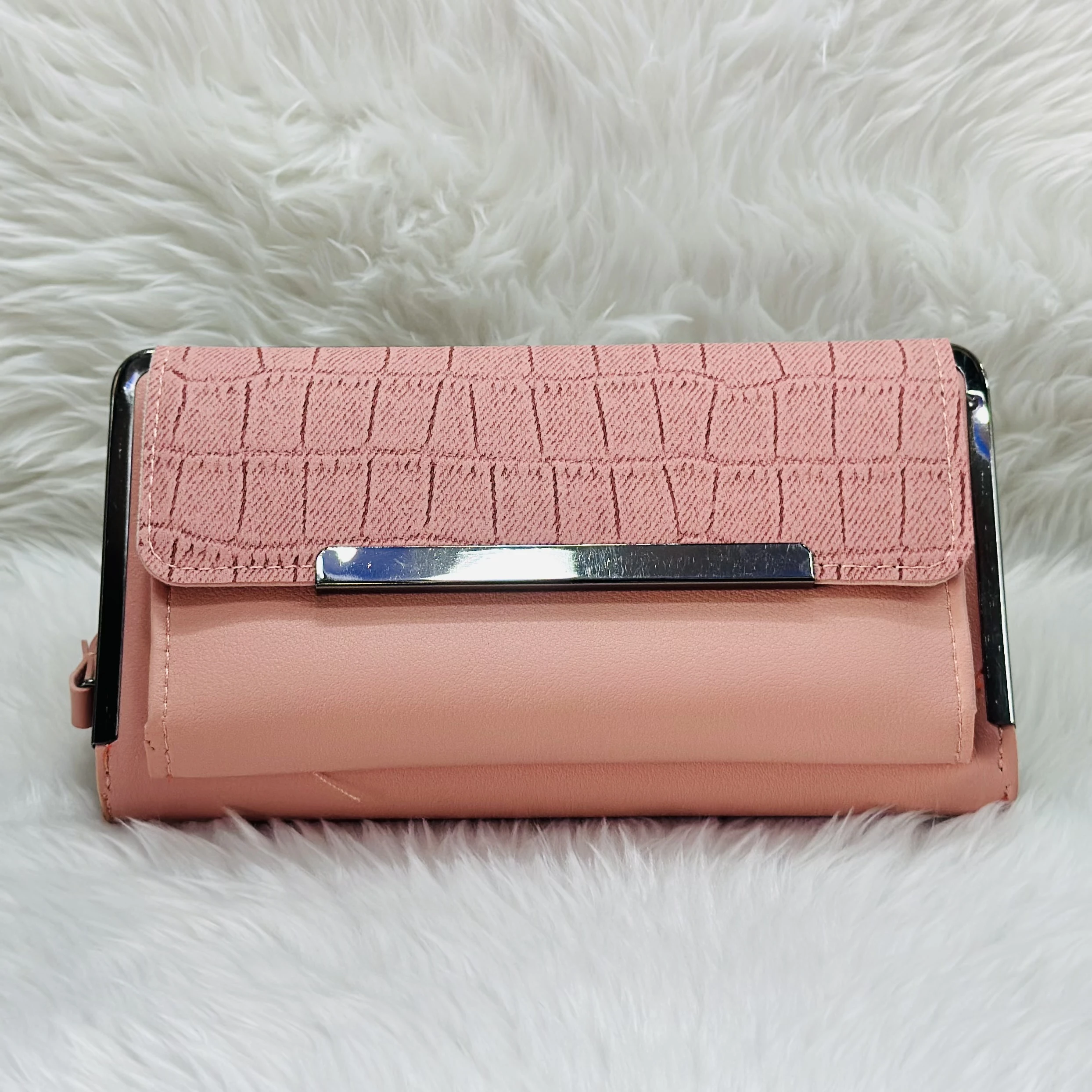 Brisfine pink clutch wallet in polyurethane outer material.