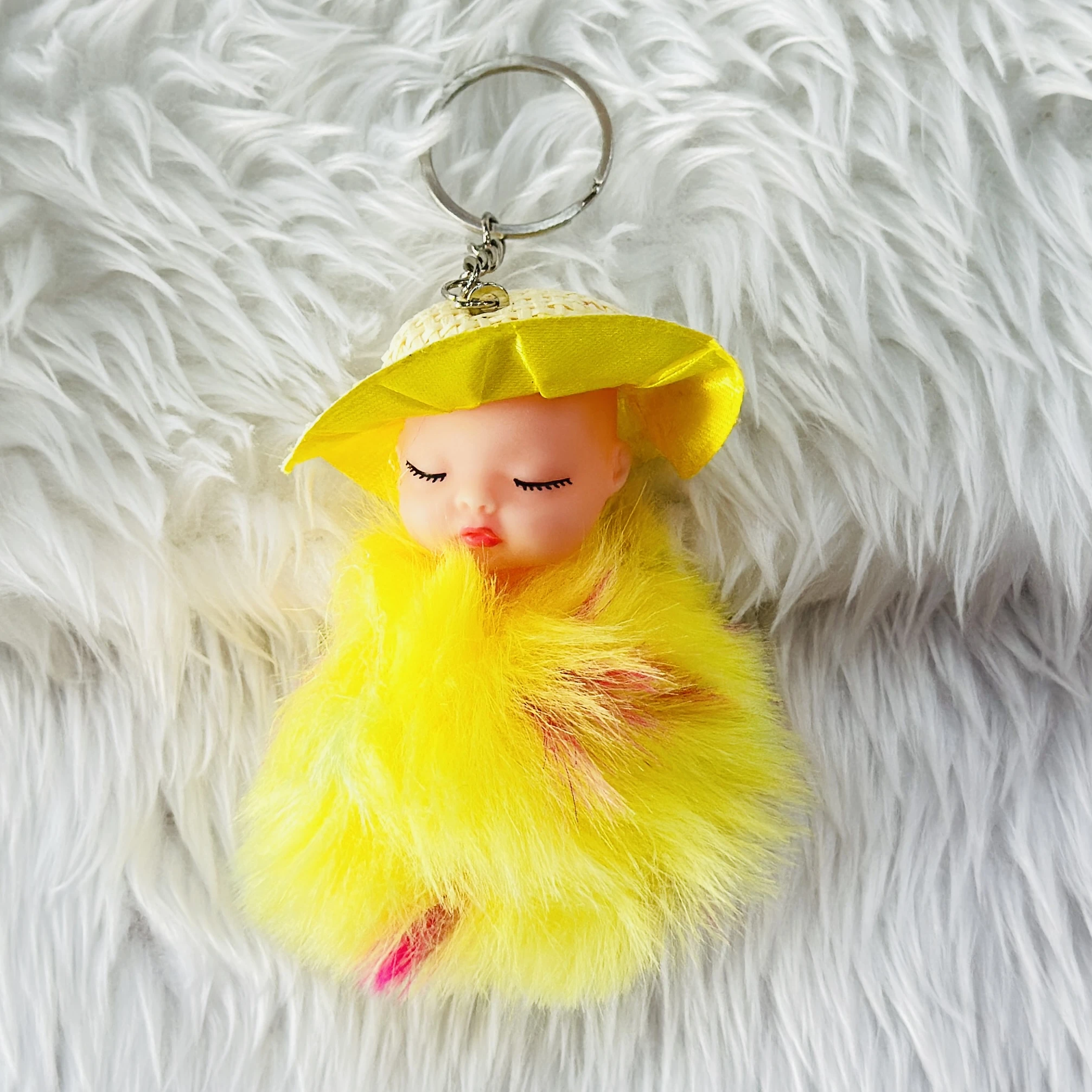 SRG Cute Sleeping Furry Baby doll with cap" keychain