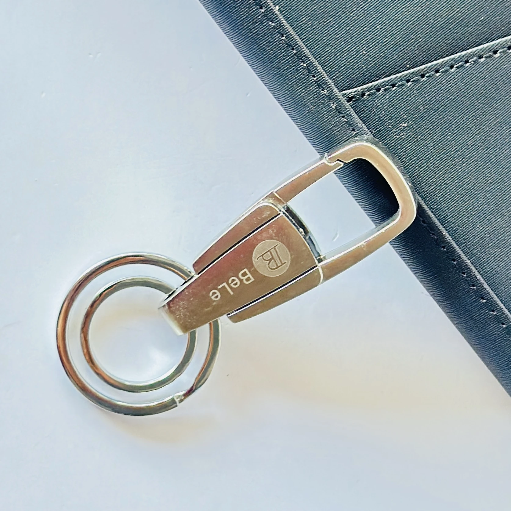 silver-toned metal keychain