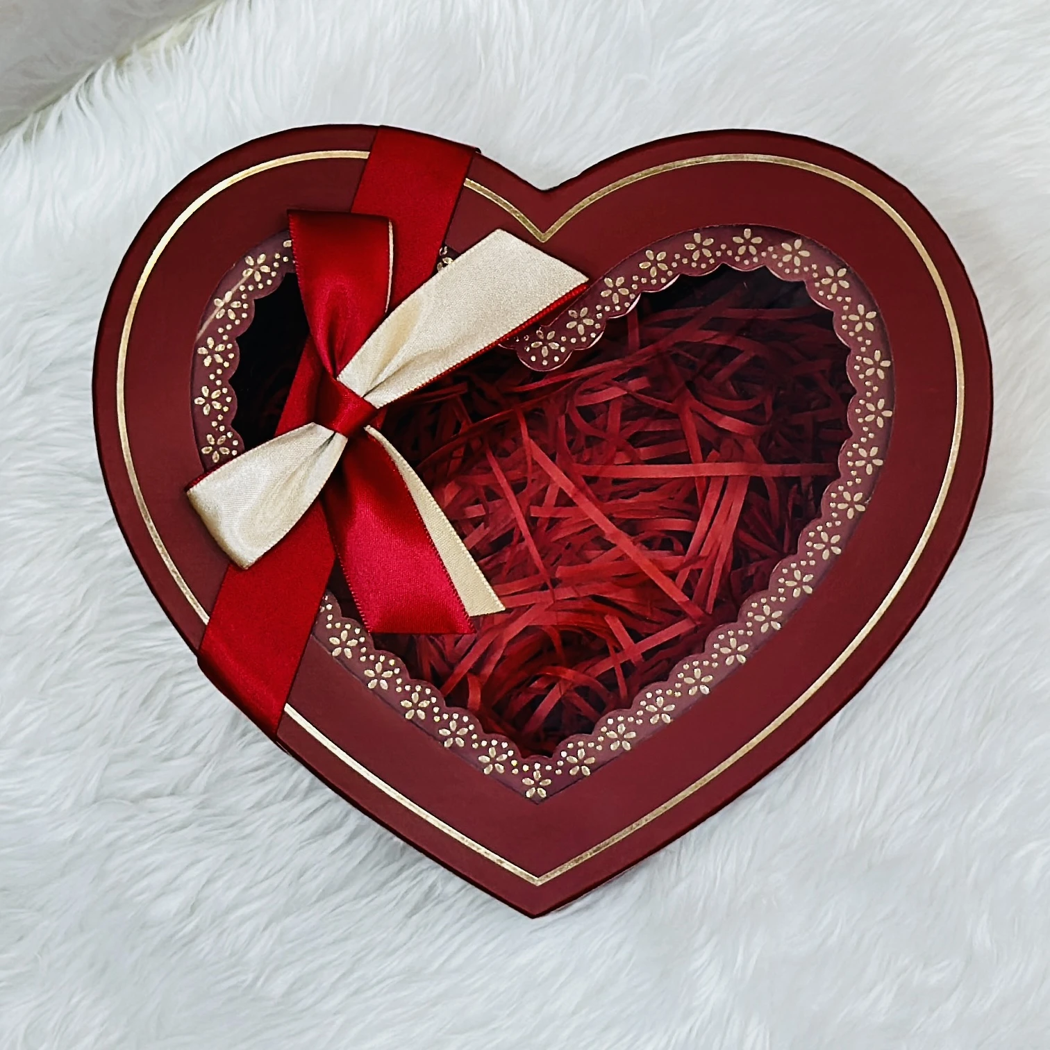 Decorative red heart-shaped box