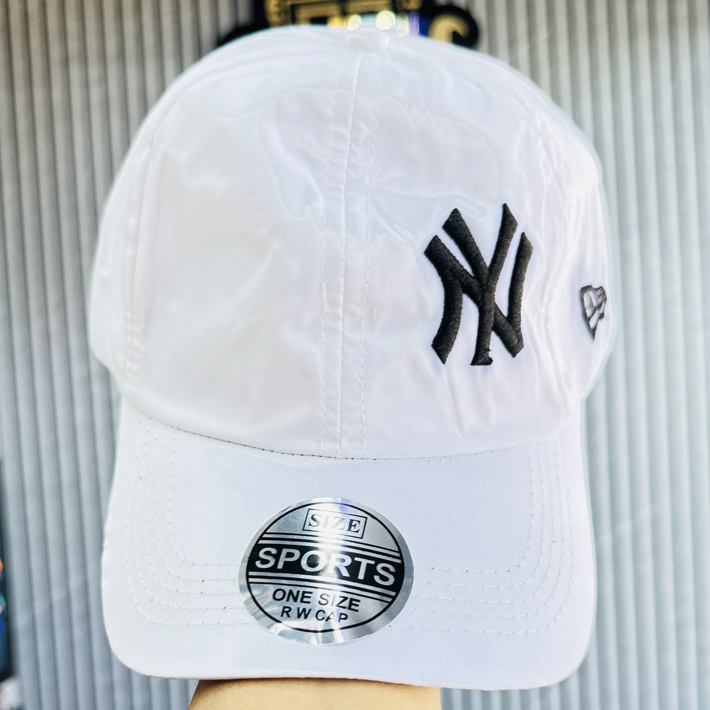 white baseball cap