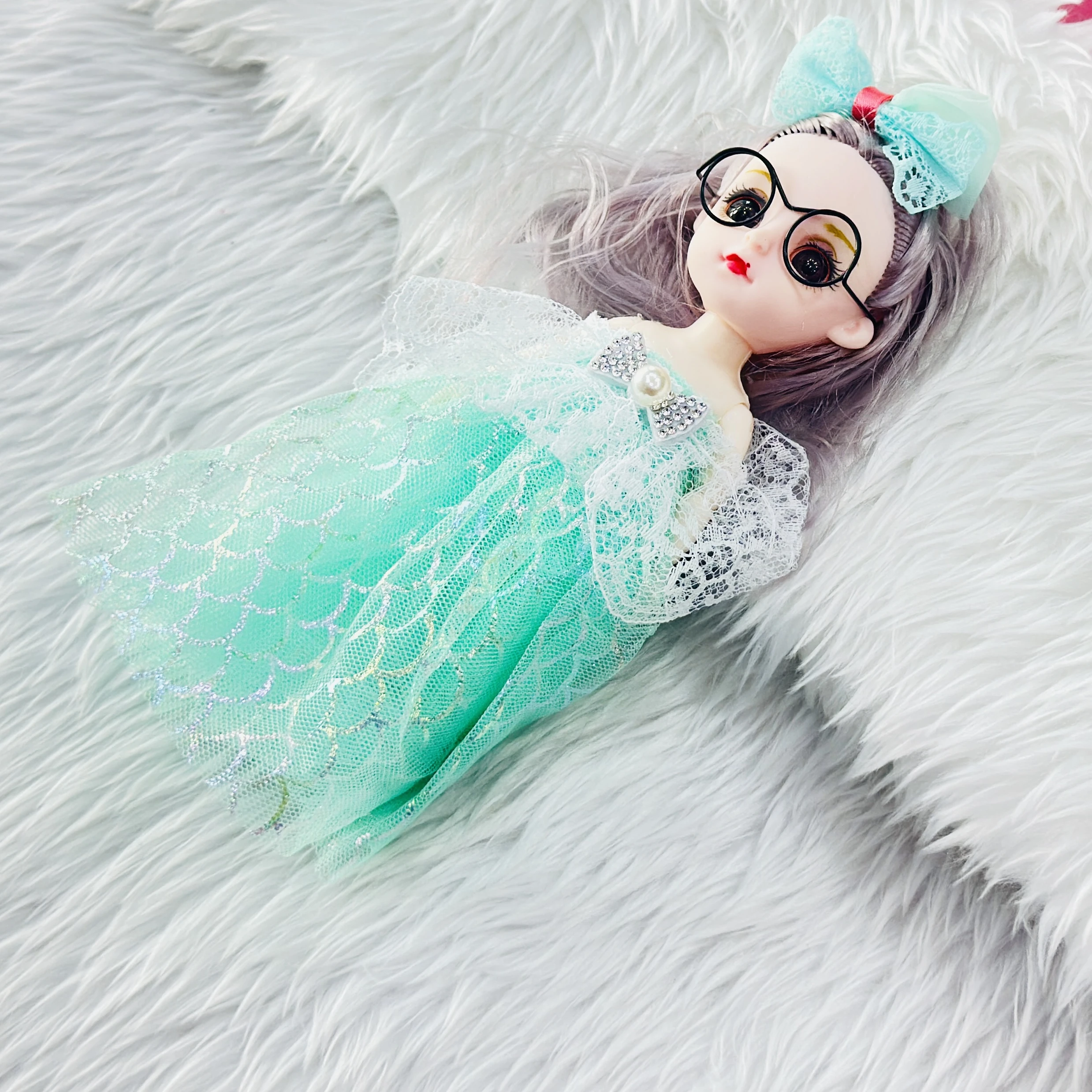 Doll  keychain featuring a fashionable