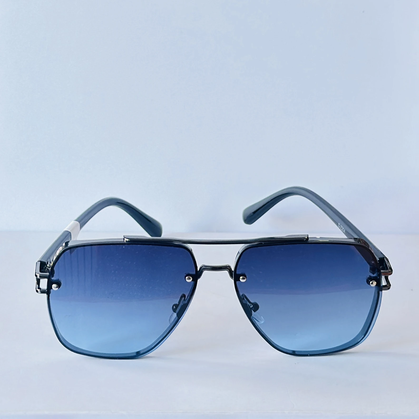 sunglasses appear to be the Maybach