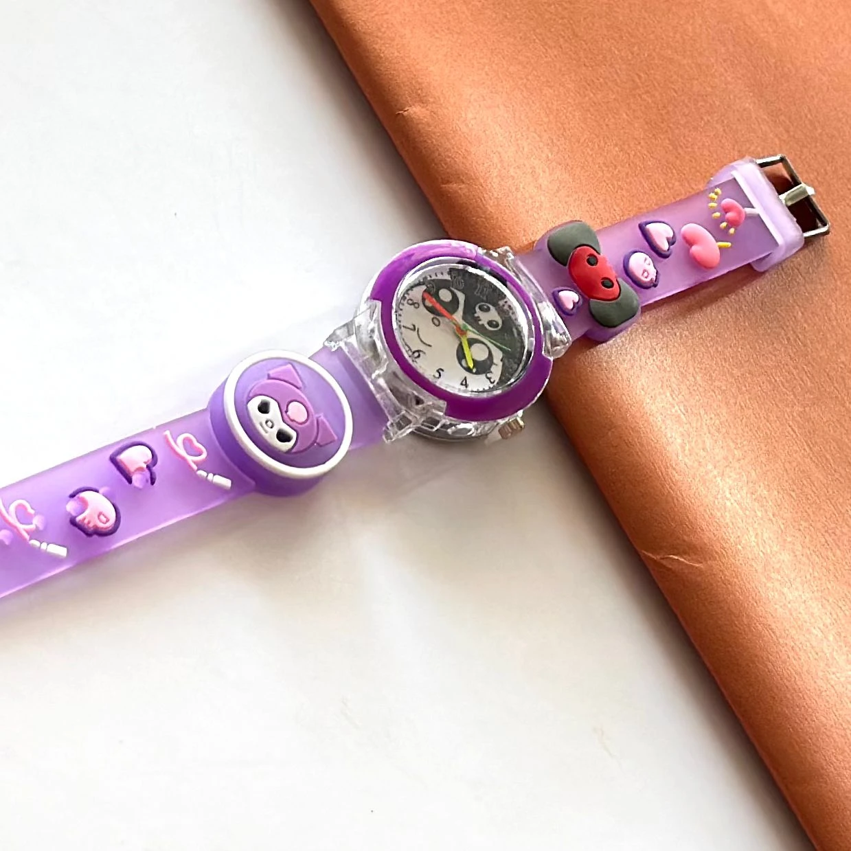 Kids analog watch with a purple silicone strap