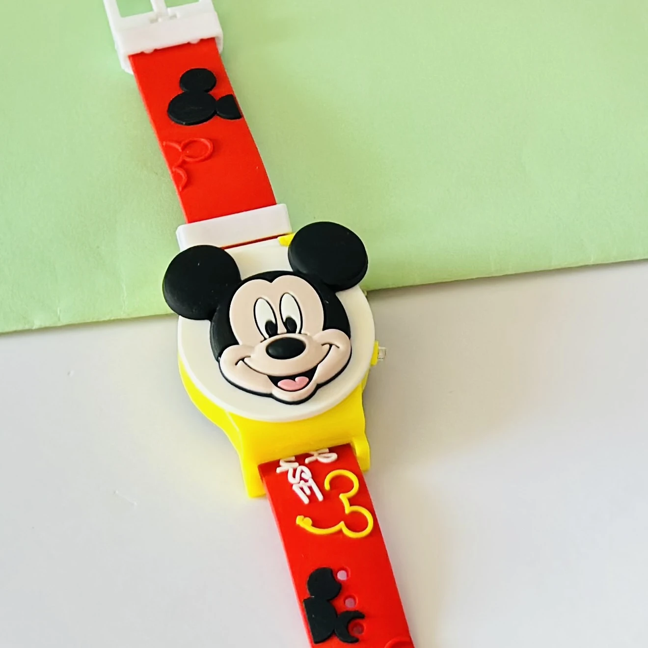kids' Mickey Mouse character digital watch.