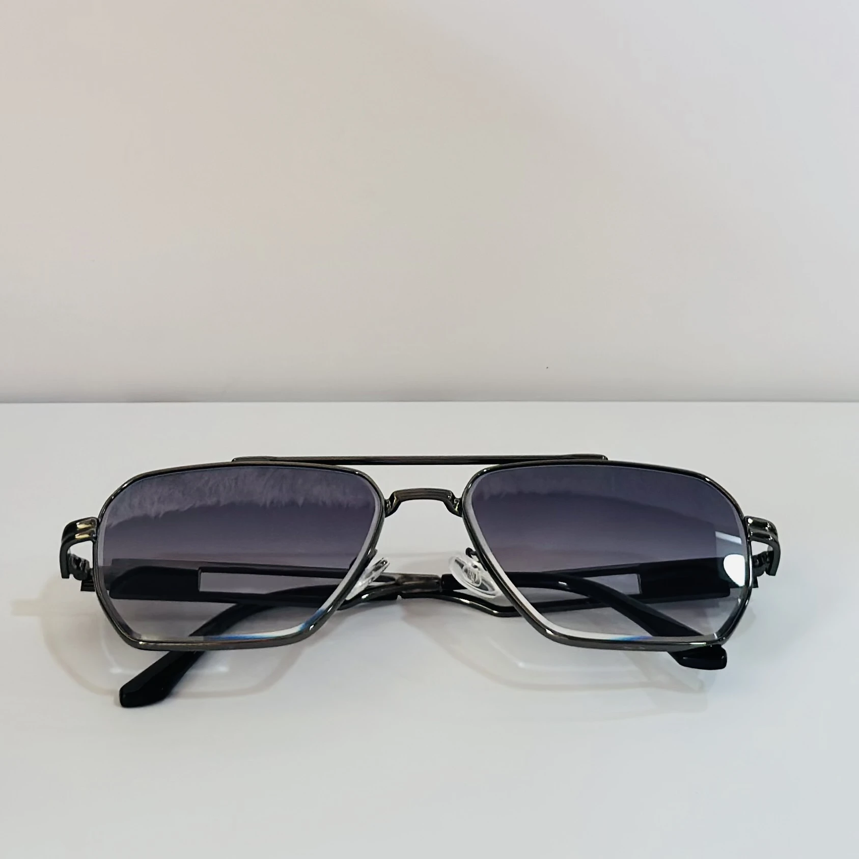 pair of Voyage unisex grey frame purple lens color wayfarer sunglasses.
