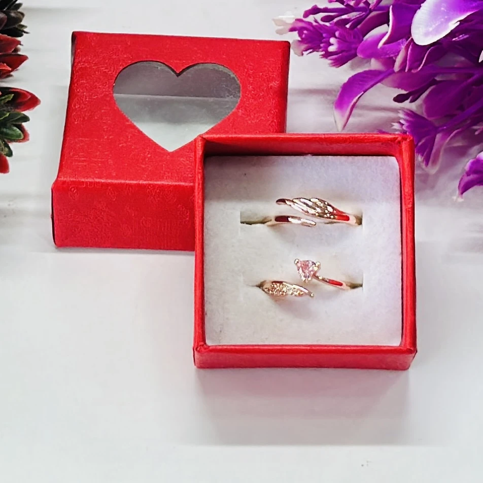 Set  of rose gold-toned couple rings