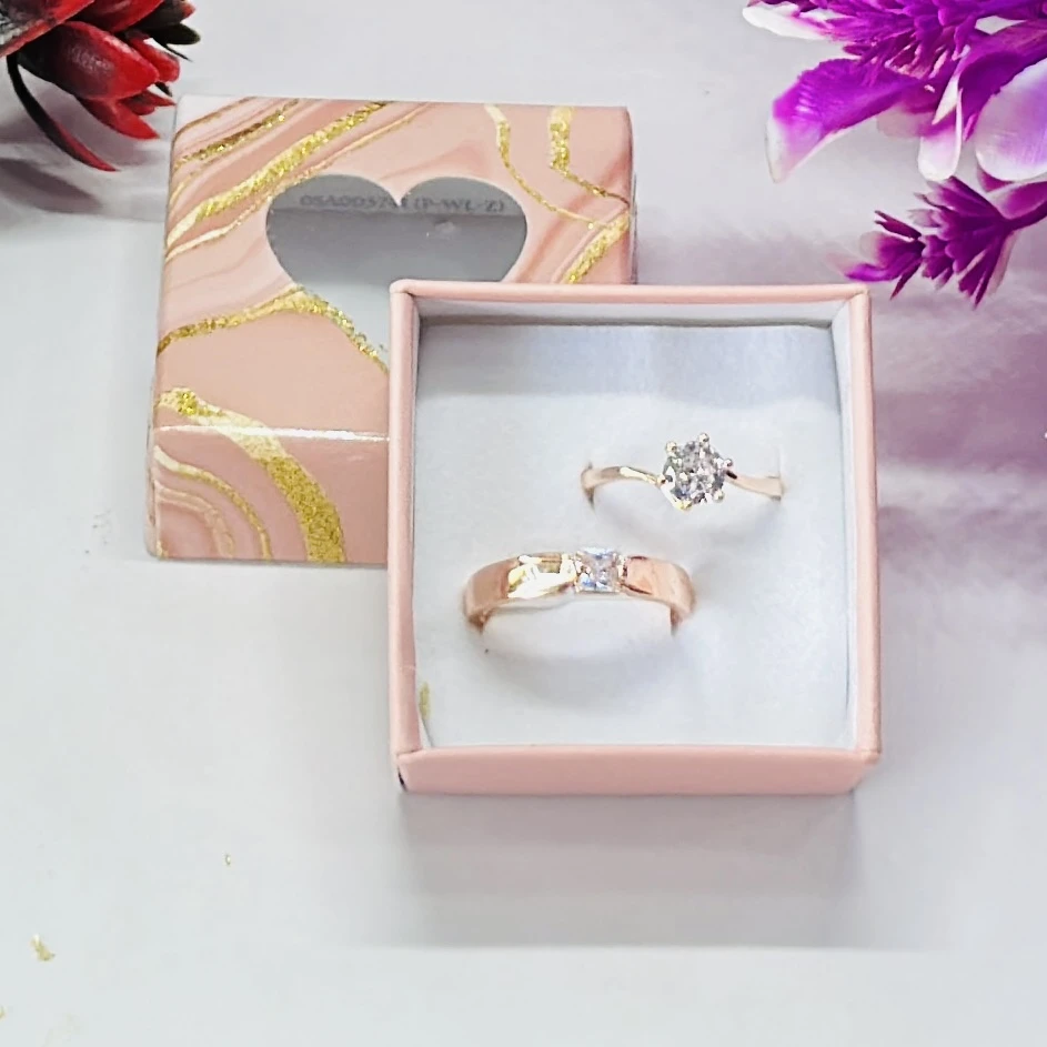 Jewel wedding wear couple rings made of 18 karat rose gold.