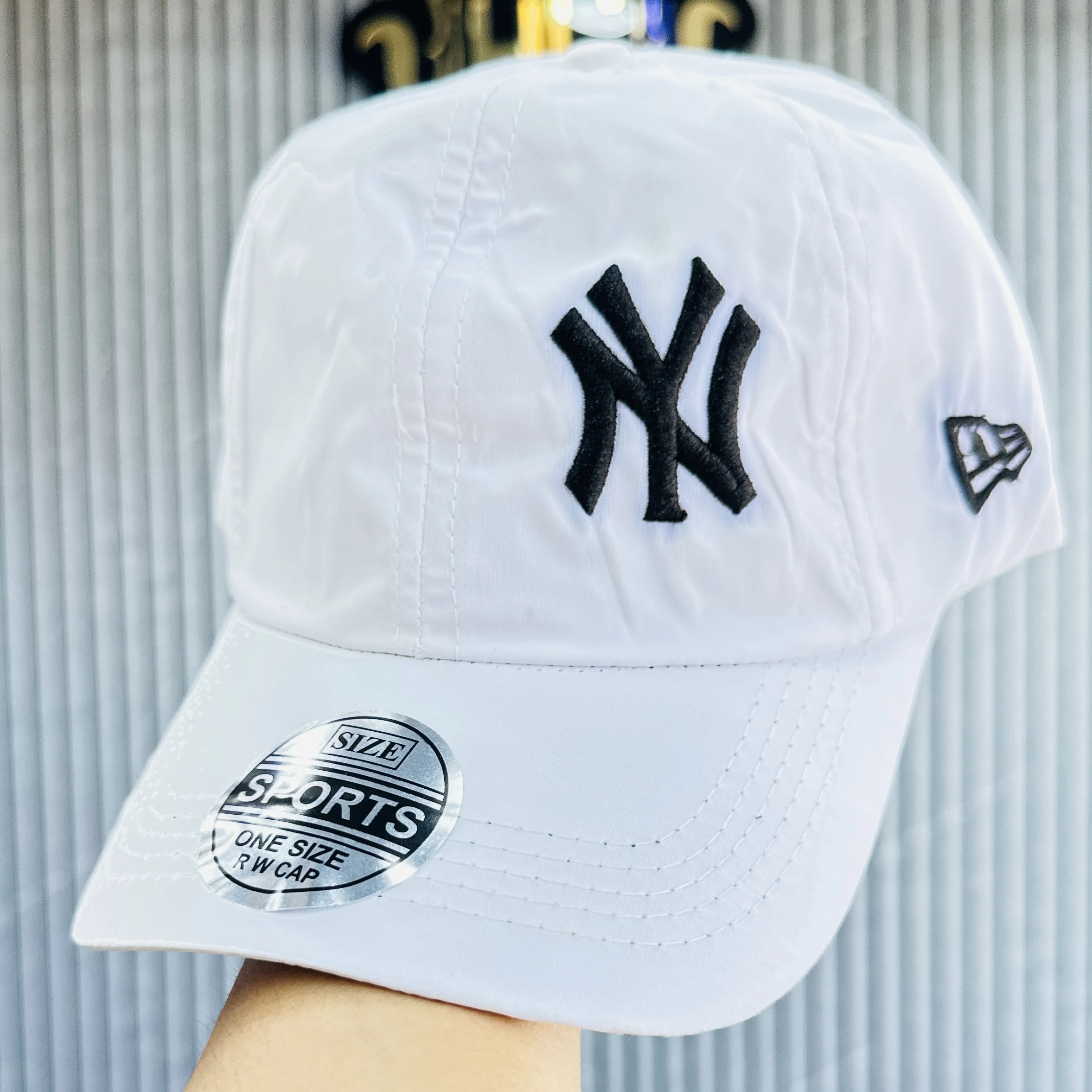 white baseball cap