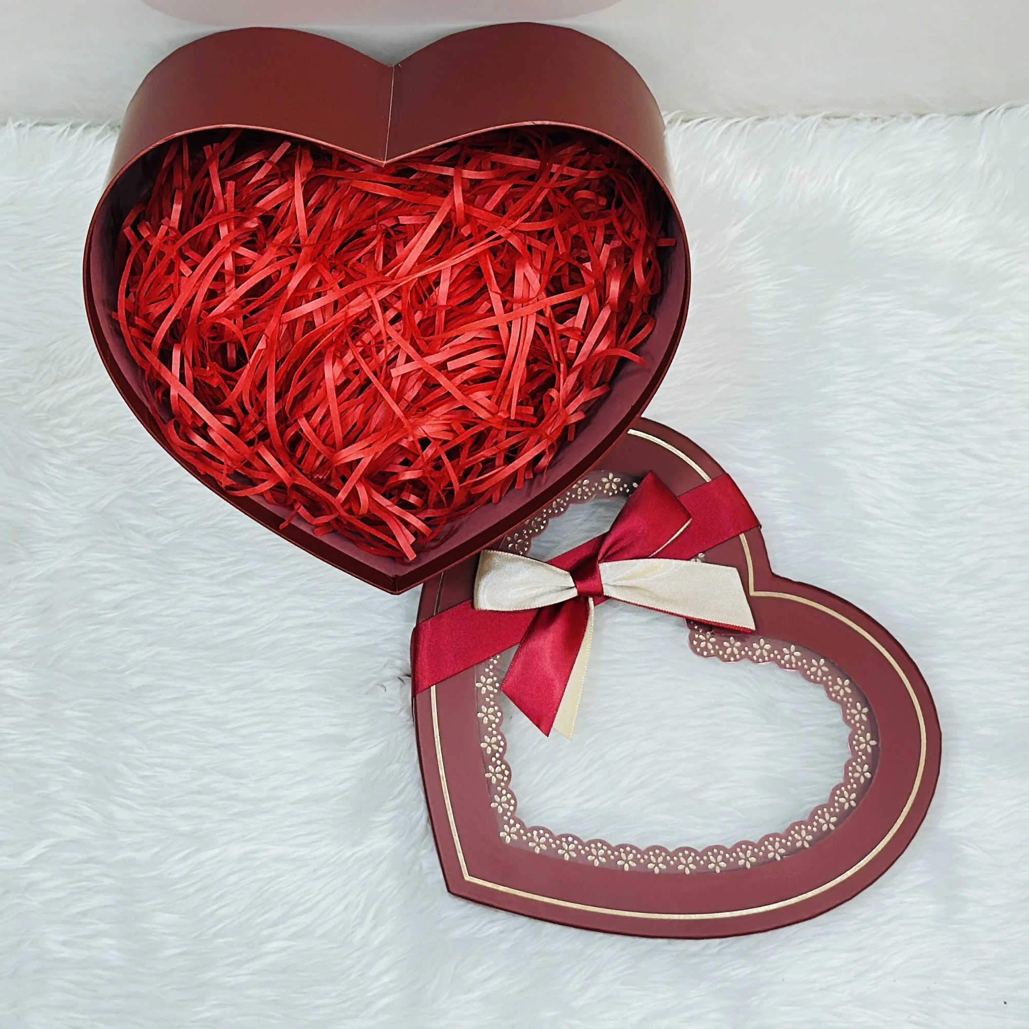 Decorative red heart-shaped box