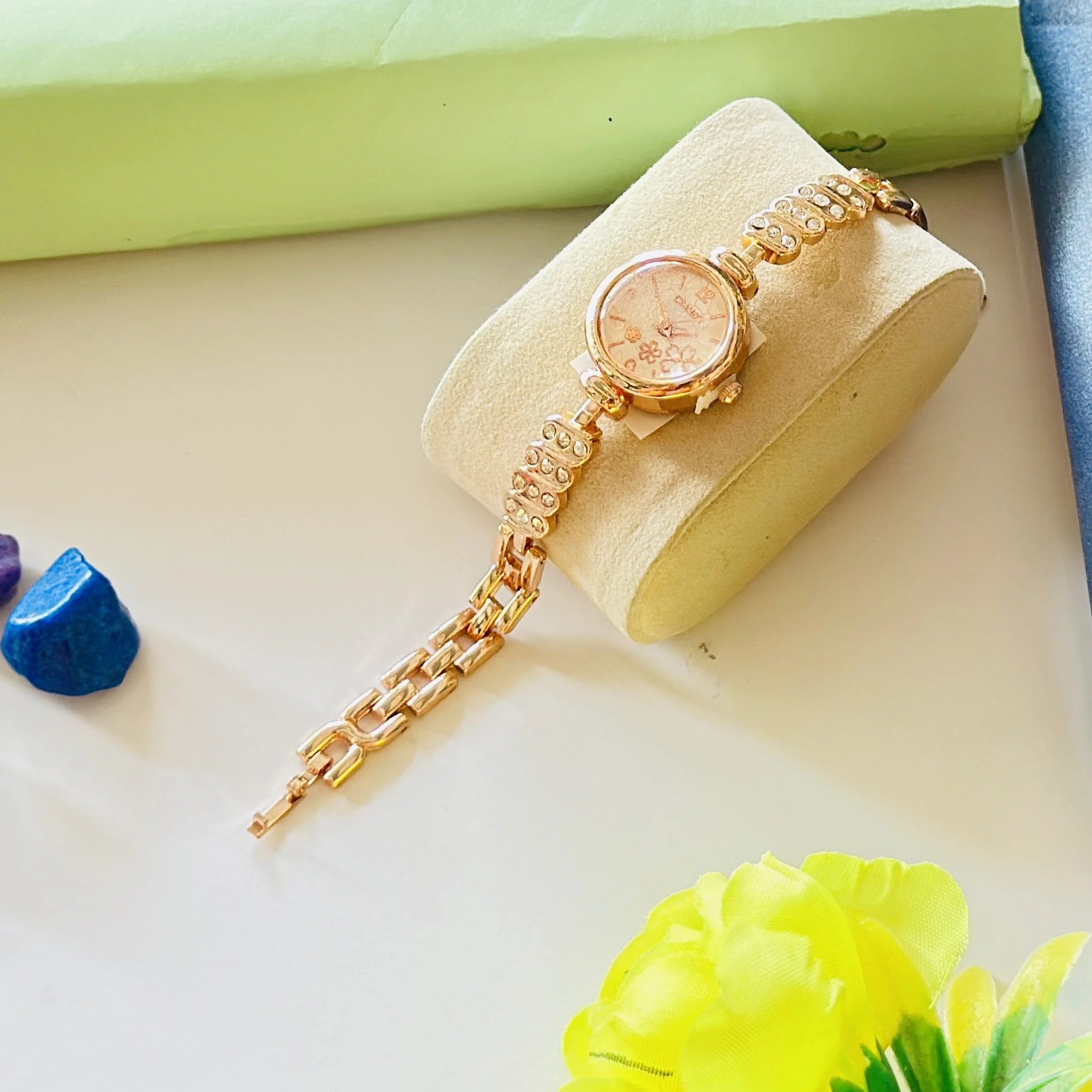 Rose gold analogue watch