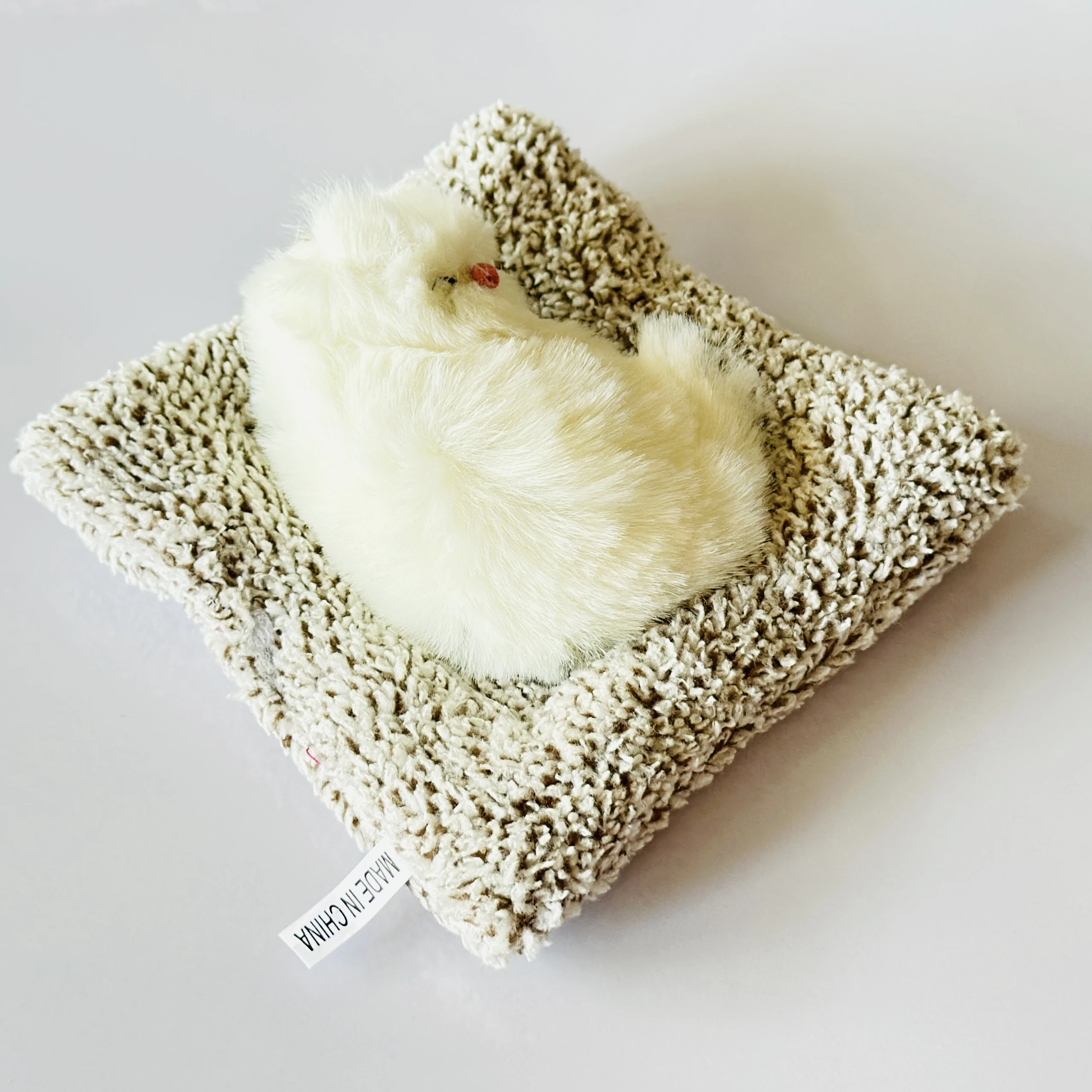 decorative sleeping cat figurine designed for car dashboards or home decor