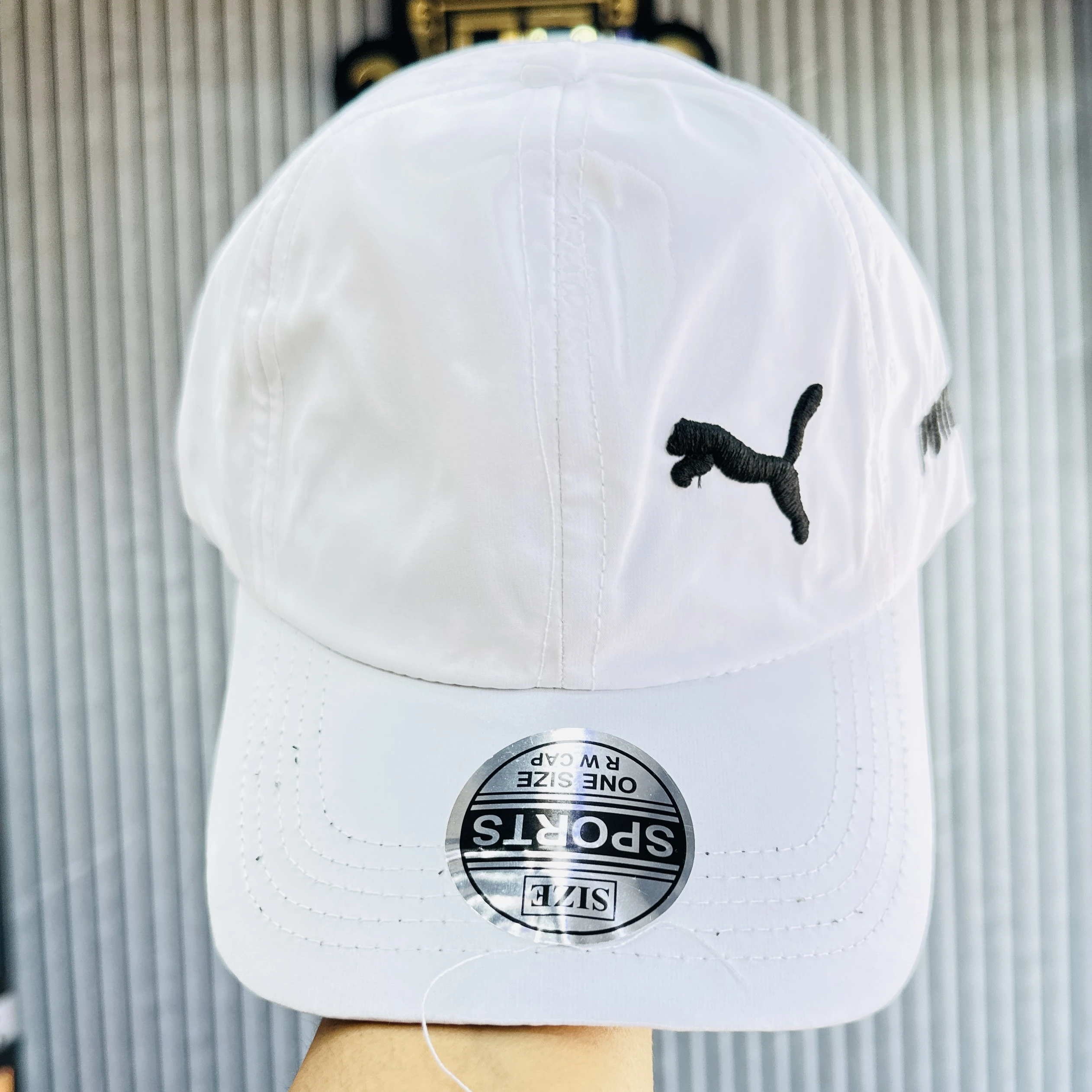white baseball cap