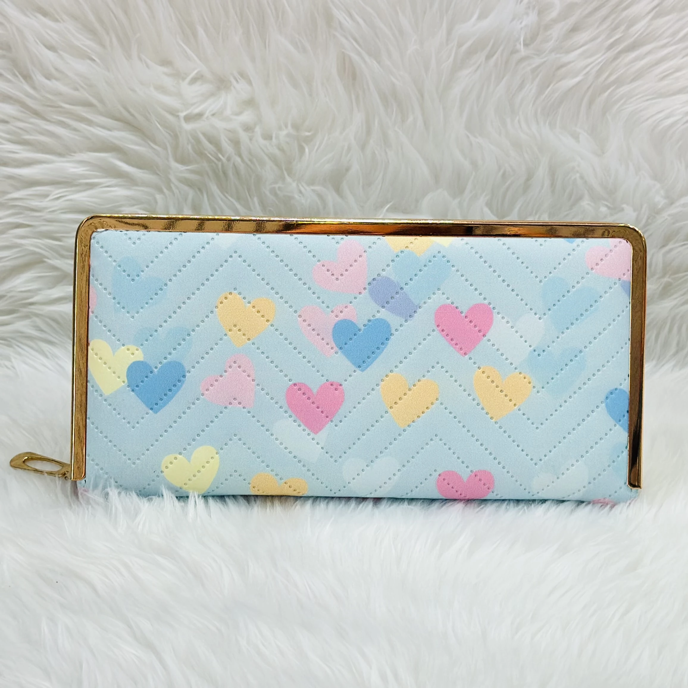 Kyraton women's long wallet with a light blue chevron and multi-colored heart pattern.