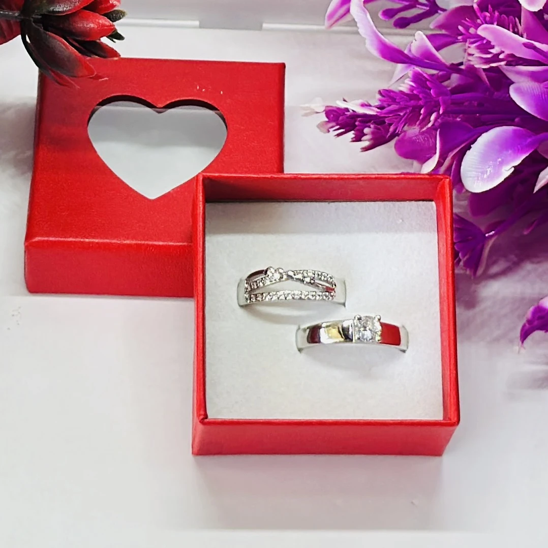 Set of silver-toned couple rings