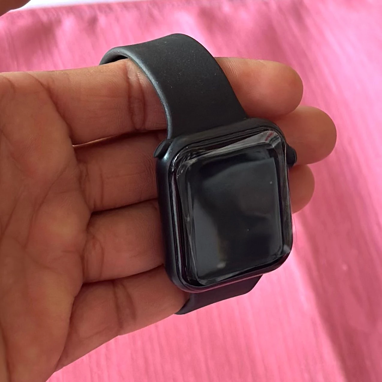 appears to be a T10 Ultra smartwatch, a non-branded wearable device.