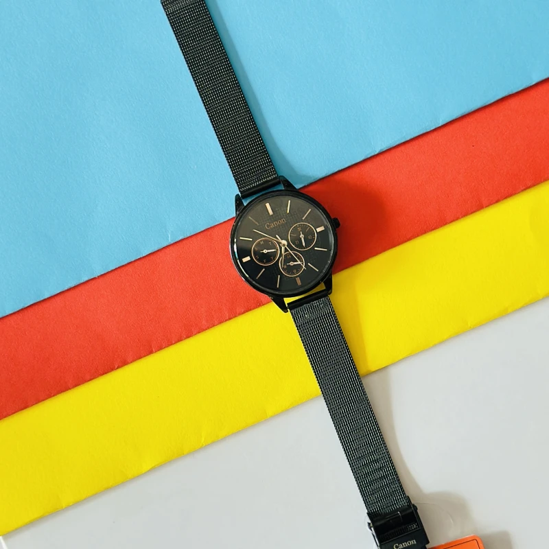Black analog quartz wristwatch