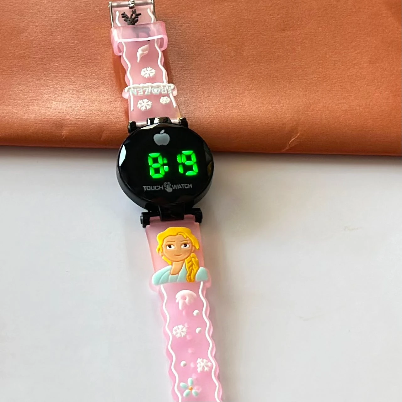 Kids digital watch with a pink silicone strap