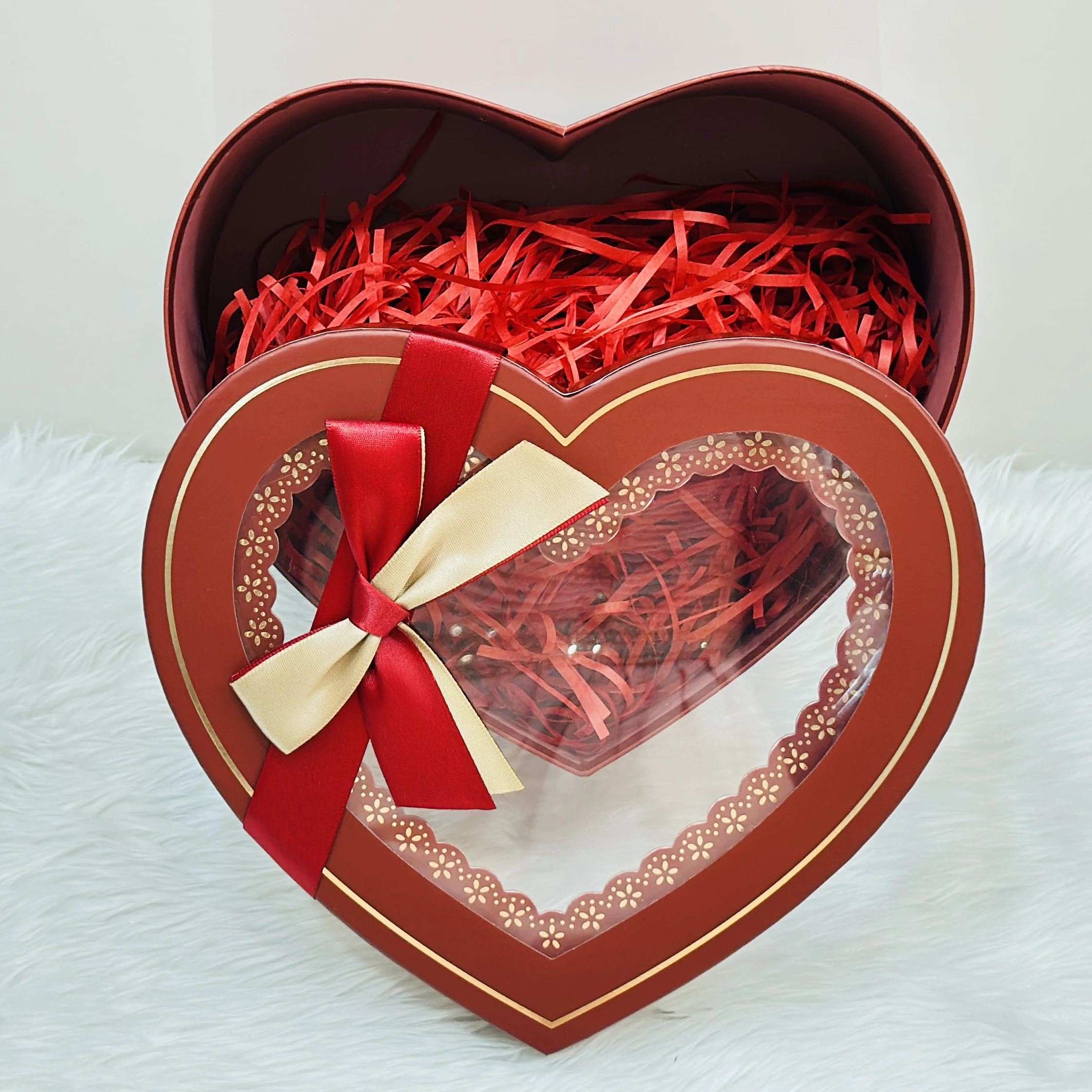 Decorative red heart-shaped box