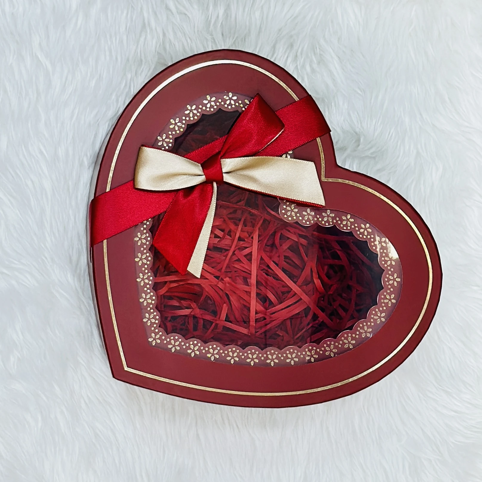 Decorative red heart-shaped box