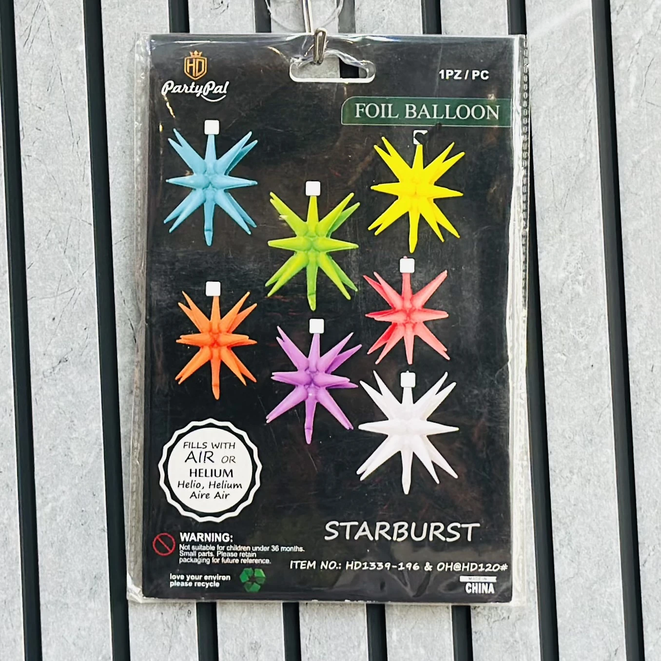 package of PartyPal Starburst foil balloons