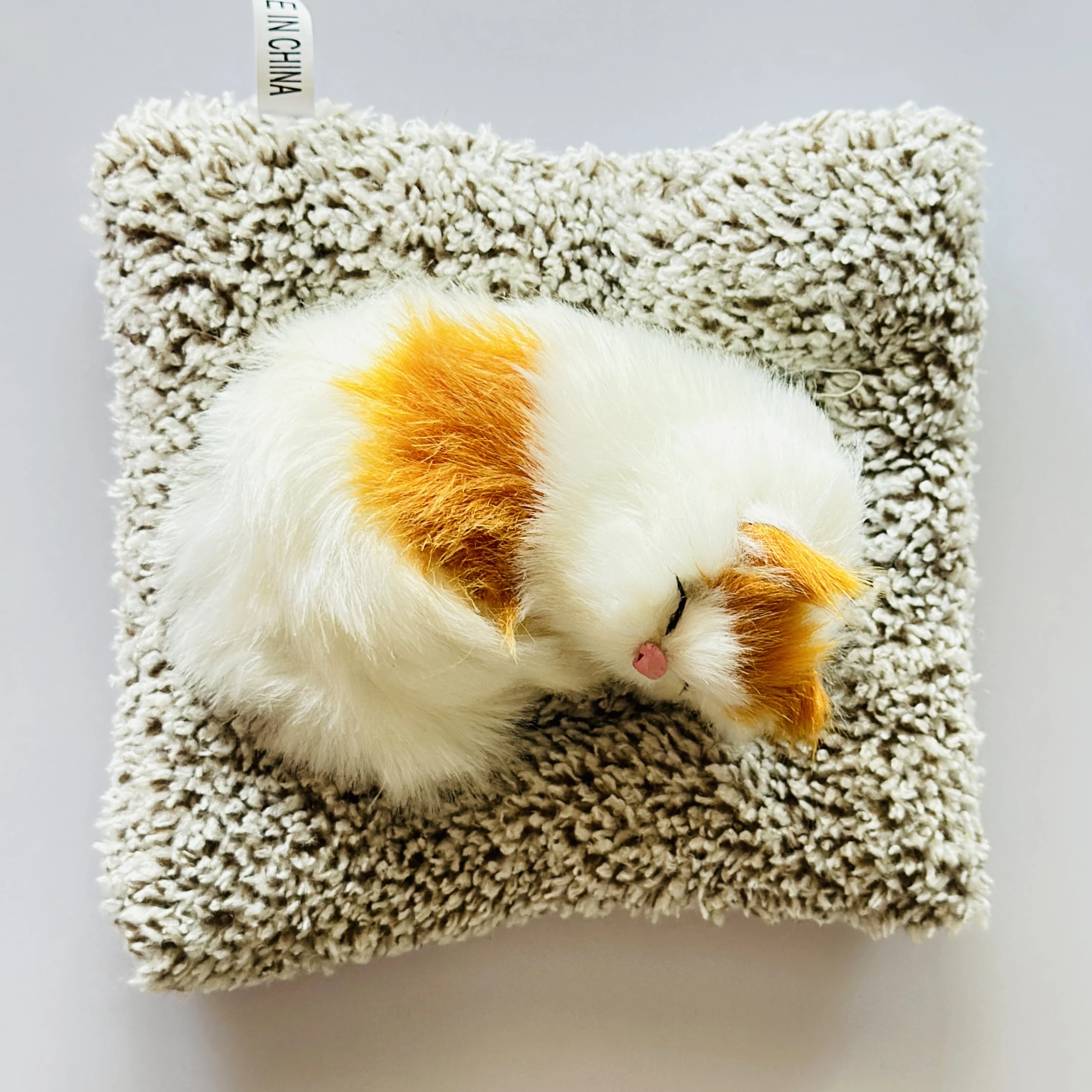 Realistic sleeping cat plush toy
